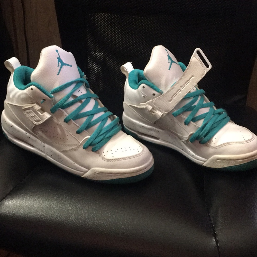 Teal and white Jordan’s